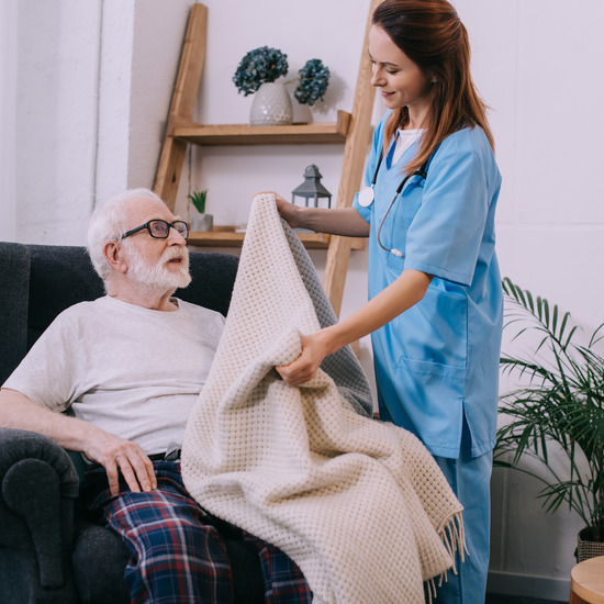 Nurse supporting neurological recovery at home